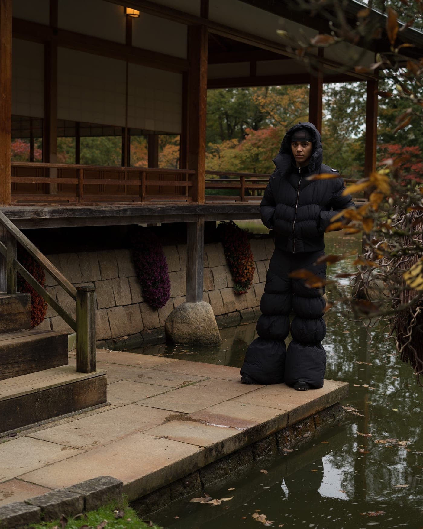 Full-length look photographed at a garden pavilion