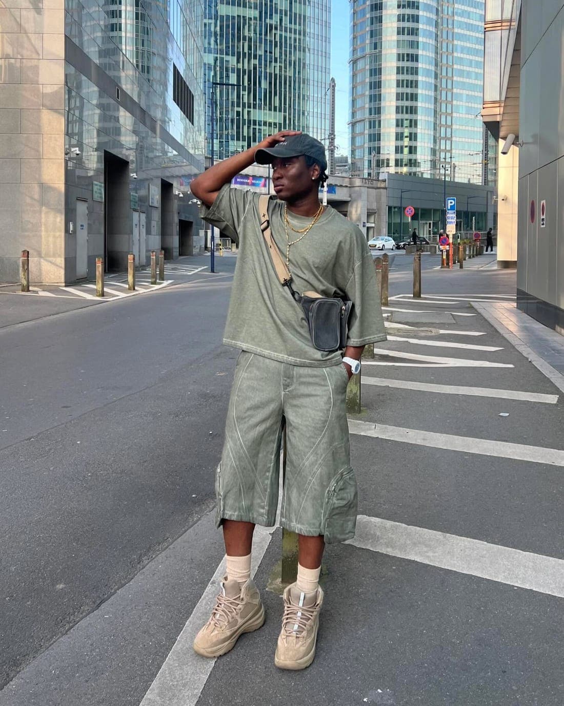 Wearer in the sage tee and short set