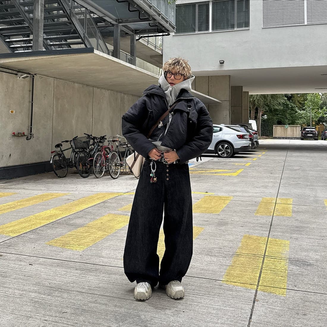 Wearer photographed on a marked street line