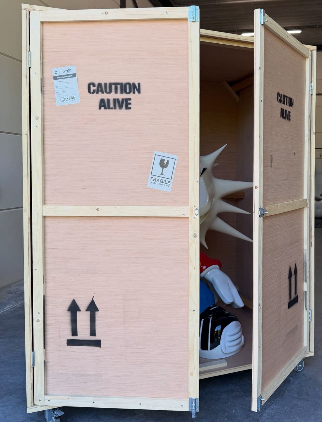The mascot printed on a shipping crate