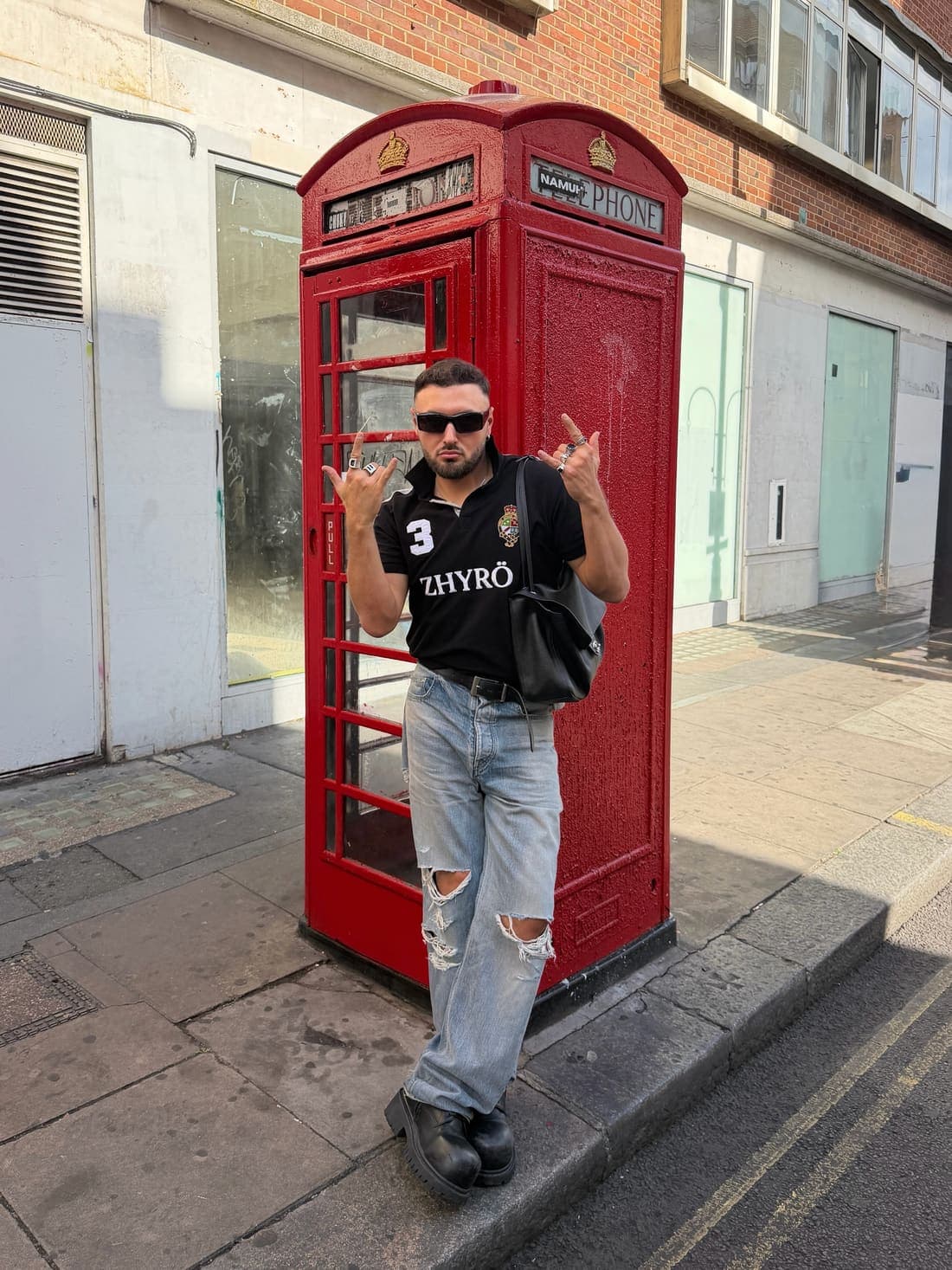 Creator post: beside a telephone box