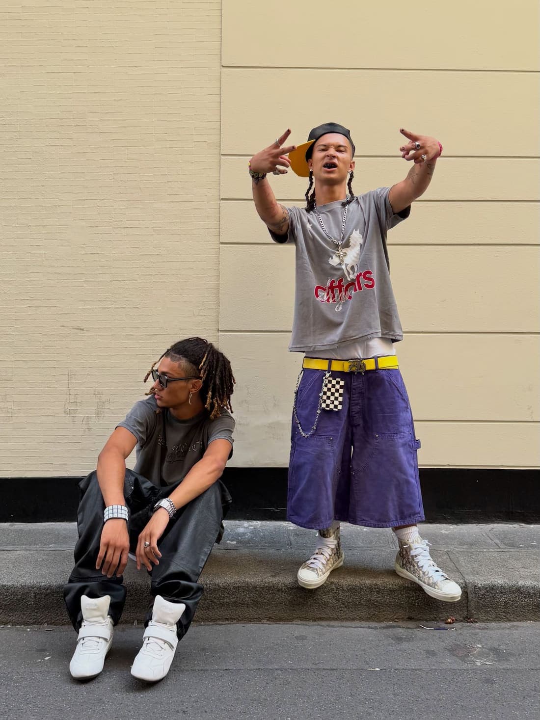 Creator post: pair against a yellow wall